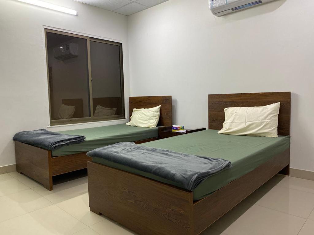• Faizi Furnished Apartments Faisalabad Exteriör bild